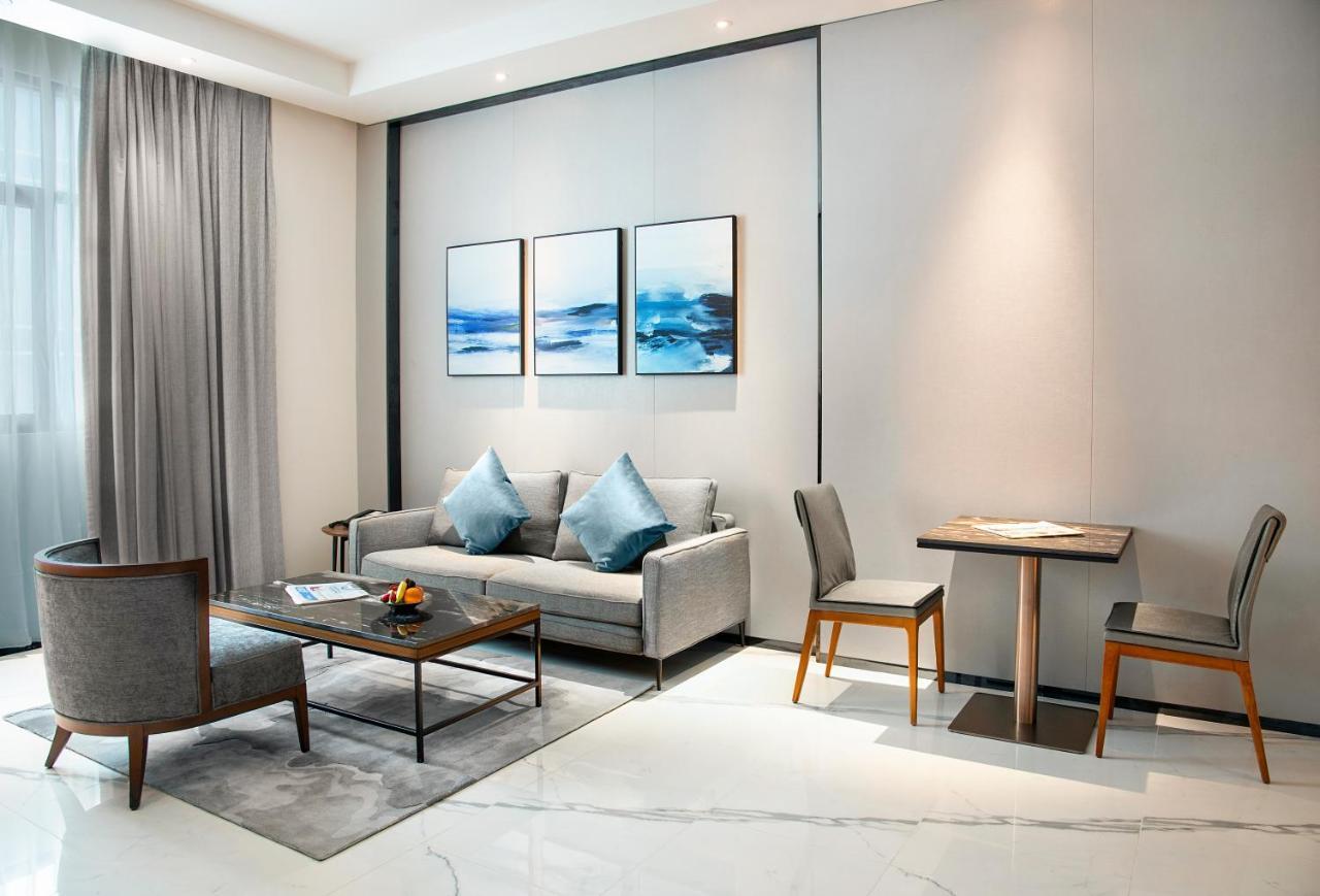 Asiana Grand Hotel Дубай Экстерьер фото A living room at the hotel