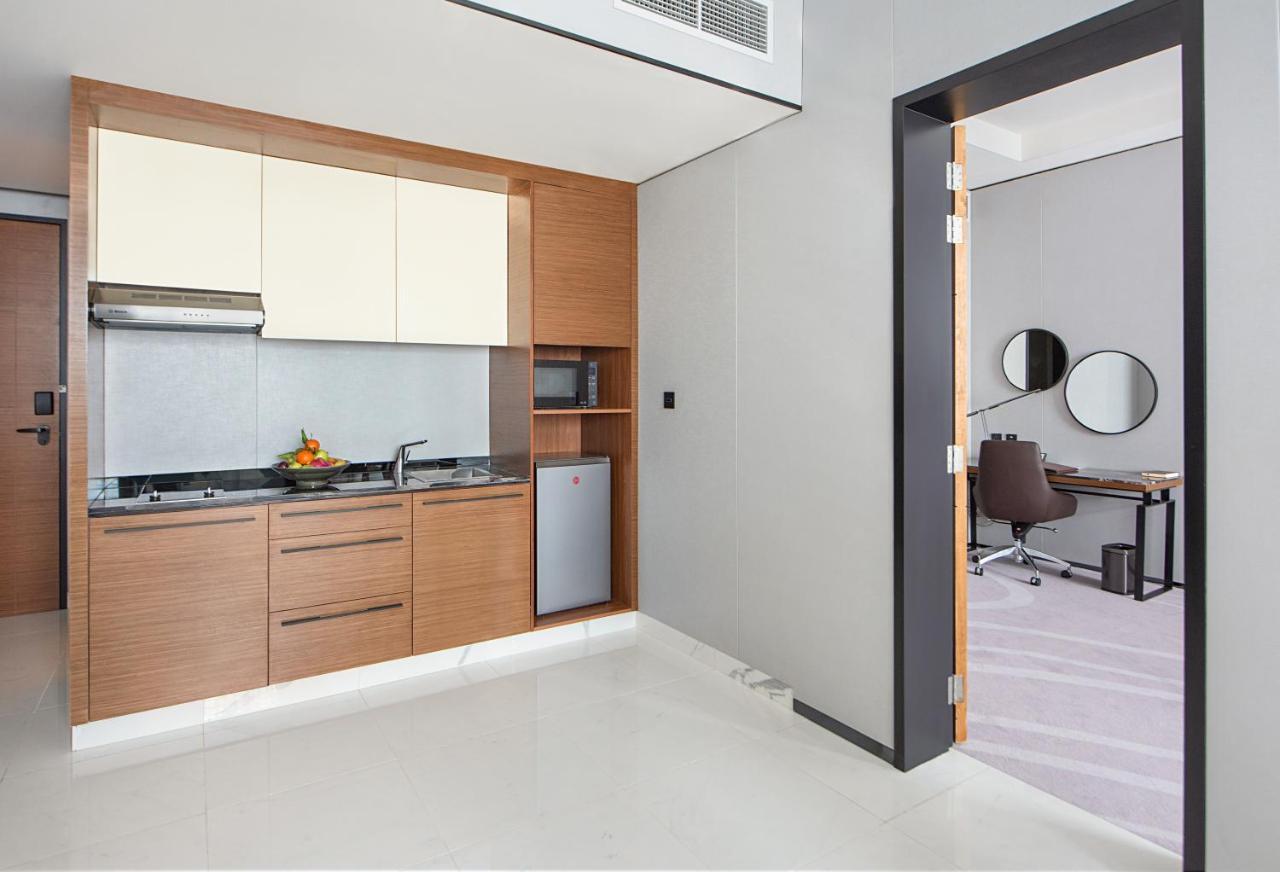 Asiana Grand Hotel Дубай Экстерьер фото A kitchenette in a hotel